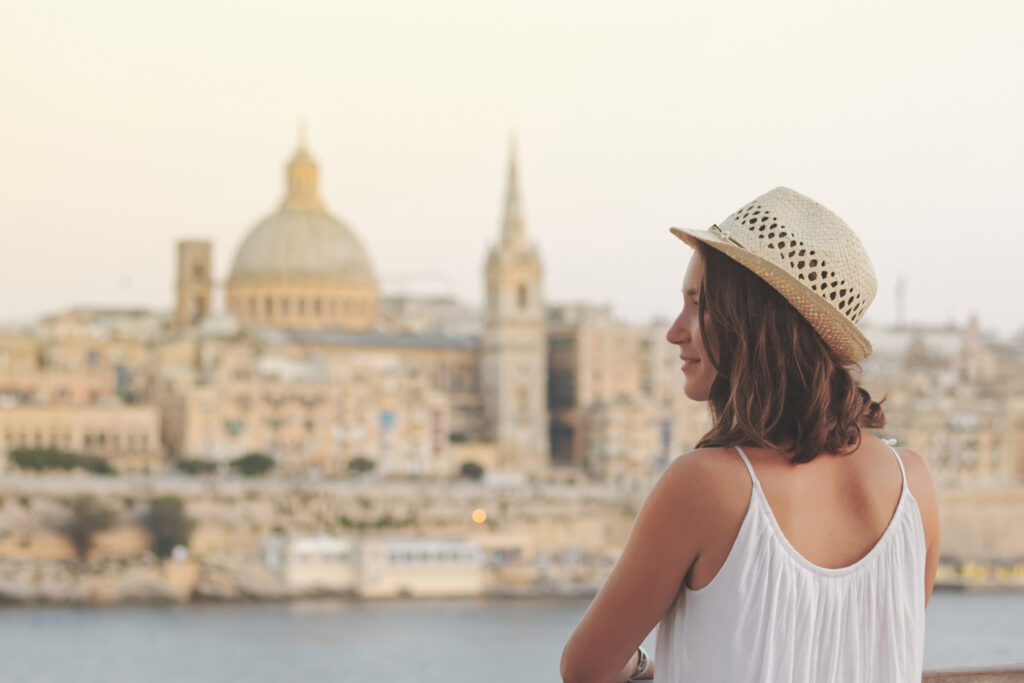 Young,Woman,Tourist,Portrait,On,Vacation,In,Valletta,Malta