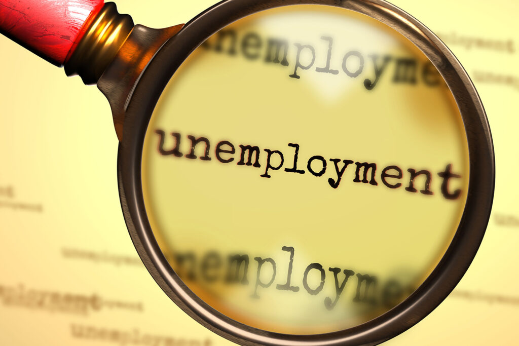 Unemployment,And,A,Magnifying,Glass,On,English,Word,Unemployment,To